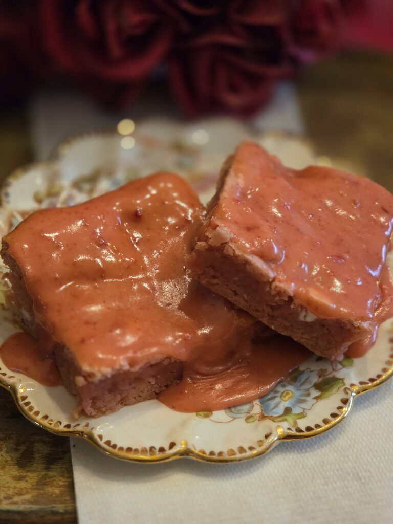 Strawberry brownie topped with strawberry glaze